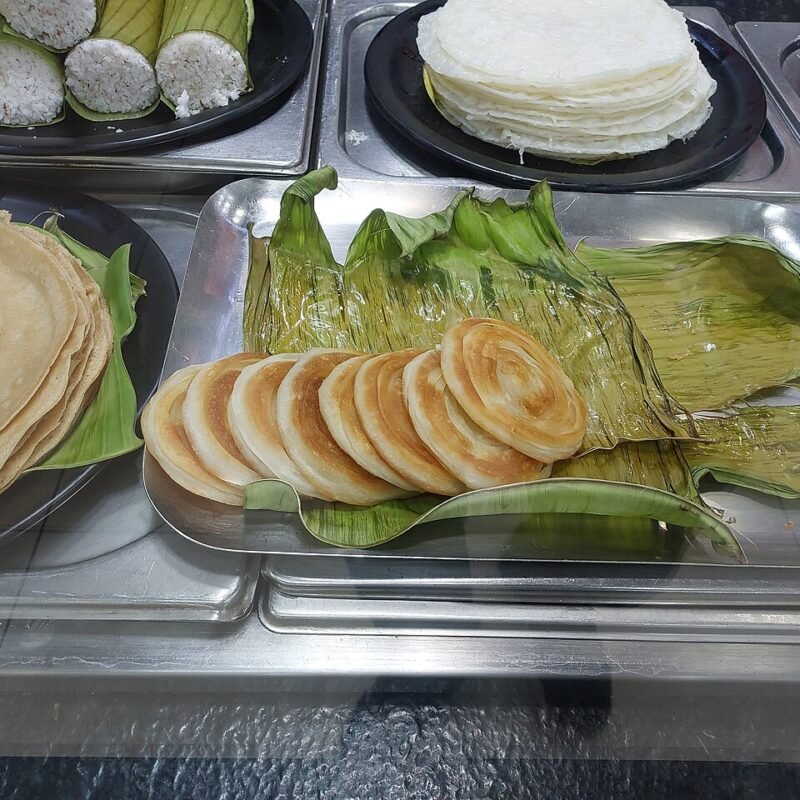 Bite-sized coin-shaped layered parottas