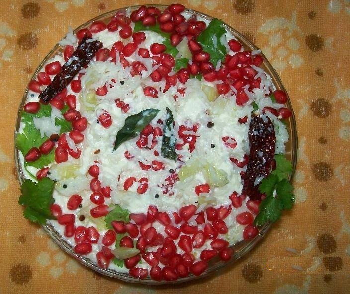 South Indian curd rice garnished with pomegranate