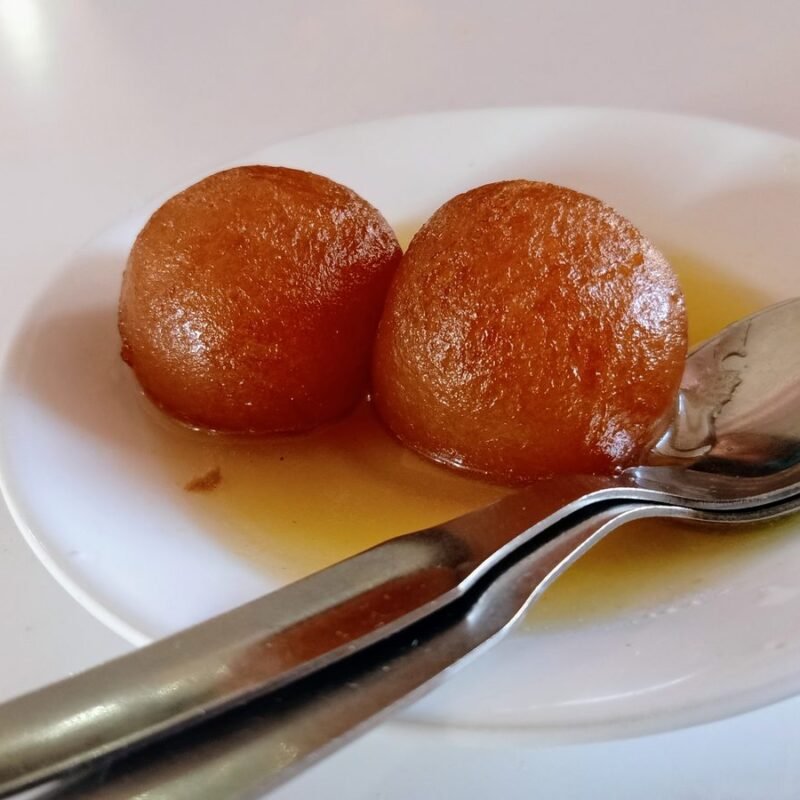 Gulab Jamun in rose-cardamom sugar syrup