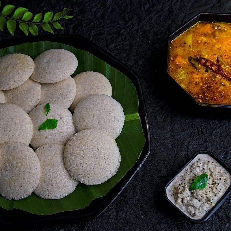 Idli with sambar and coconut chutney
