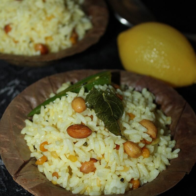 Tangy South Indian lemon rice with peanuts and curry leaves