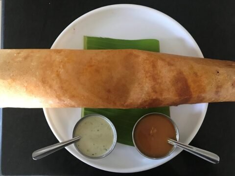 Masala Dosa served with chutney and sambar