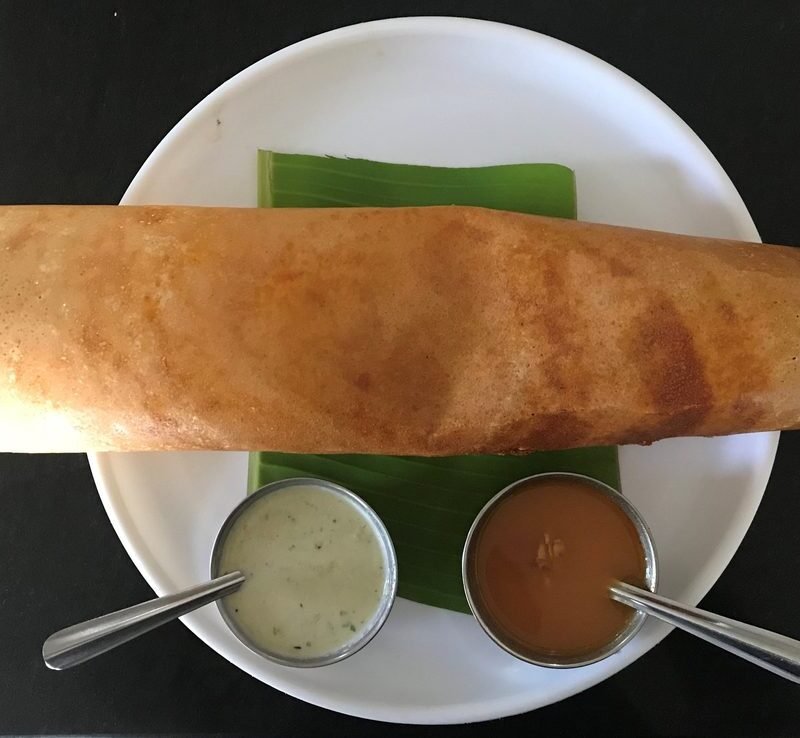 Masala Dosa served with chutney and sambar