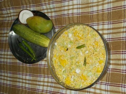 Soaked moong dal tossed with cucumber, mango and coconut