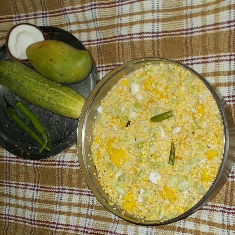 Soaked moong dal tossed with cucumber, mango and coconut