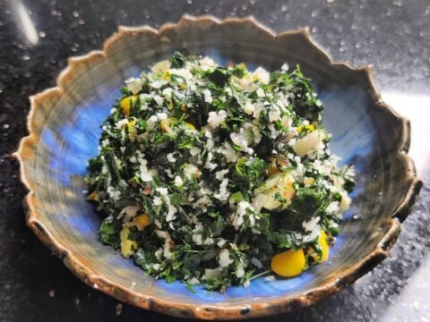 Stir-fried drumstick leaves with grated coconut