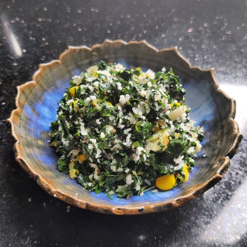 Stir-fried drumstick leaves with grated coconut