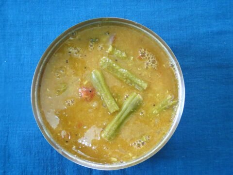 Traditional sambar with drumstick pieces
