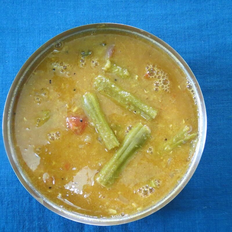 Traditional sambar with drumstick pieces