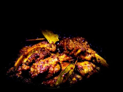 Dry spicy South Indian mutton chukka roasted with curry leaves