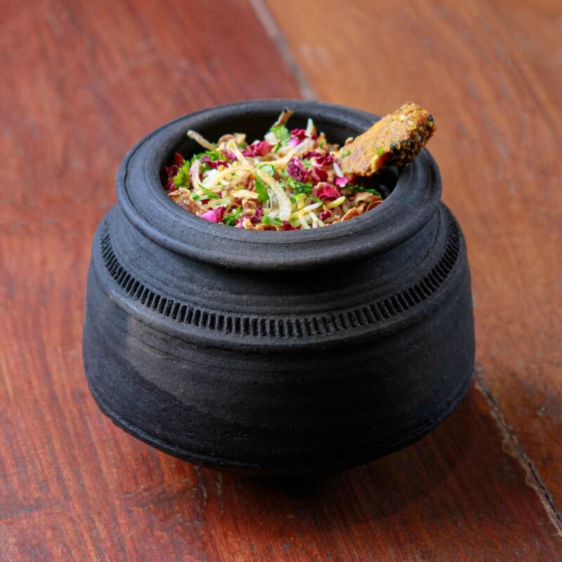Rice dish served in a traditional clay pot