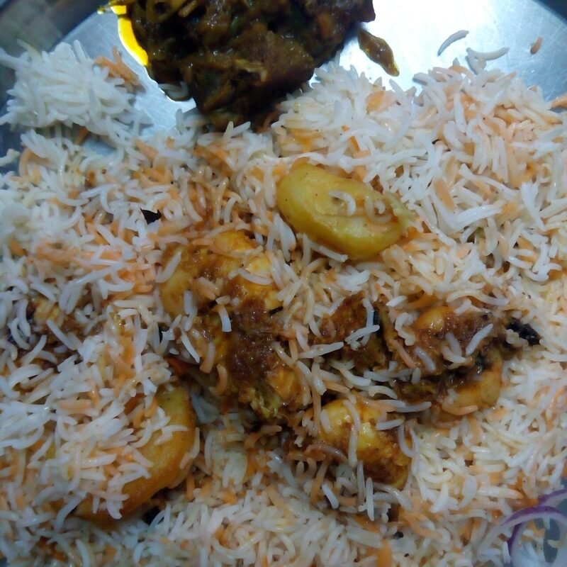 Prawn biryani with prawns mixed into fragrant rice
