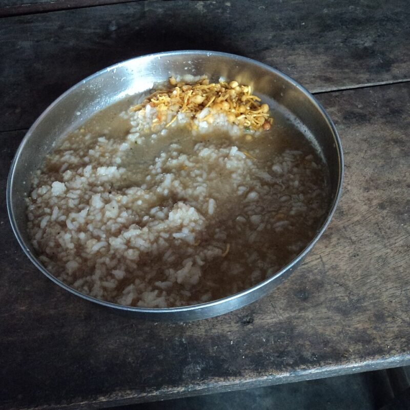 Rice served with tangy traditional rasam