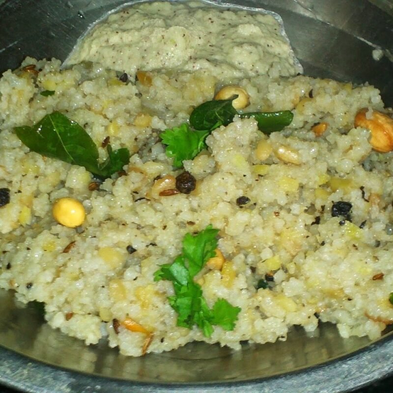 Kodo millet pongal garnished with cashew and curry leaves