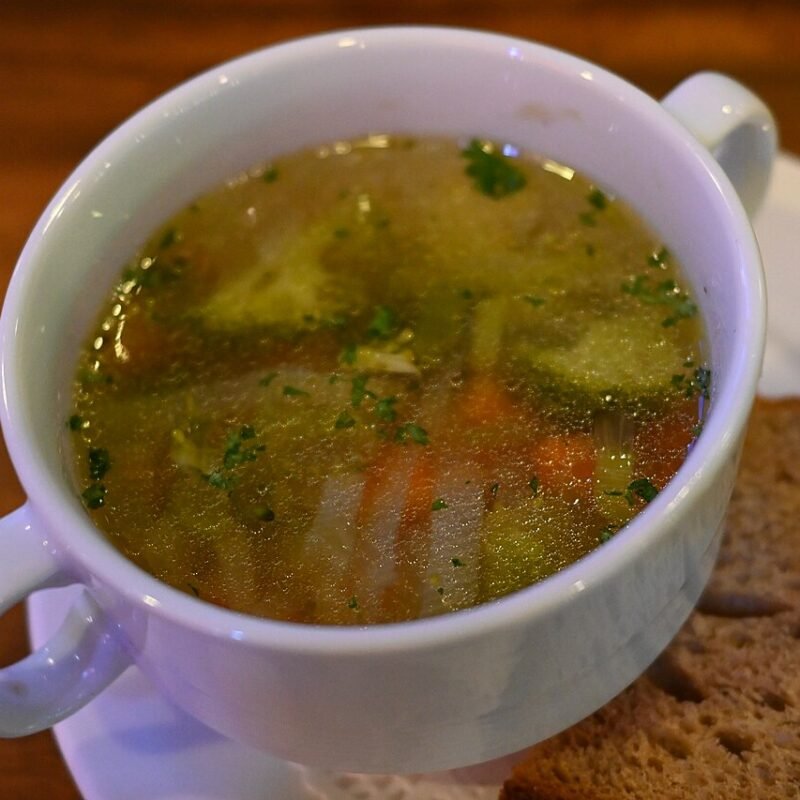 Light mixed vegetable soup with fresh herbs